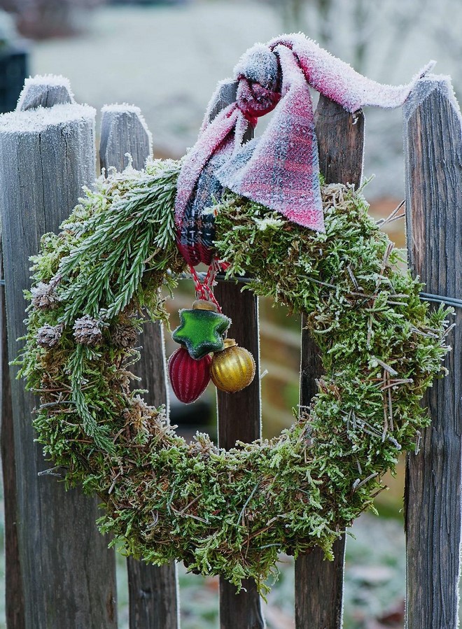 hanging outdoor christmas decor festive wreath of moss with tree ornaments and wide ribbon